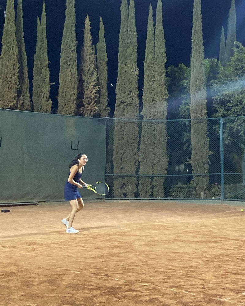 Mariana playing tennis
